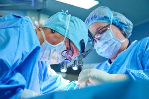 GYN Surgeries - fertility clinic - gynecologist clinic Surgeons performing surgery with advanced optical equipment.